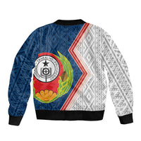 Unisex bomber jacket with blue back and white geometric sides, crest graphic, ribbed cuffs
