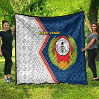 Cape Verde quilt laid flat with blue right panel, white left panel, and crest emblem