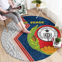 Round area rug with bold emblem seal, "CAPE VERDE" lettering, and blue patterned design