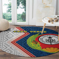 Round area rug with Cape Verde emblem seal and blue, red, green pattern across the center