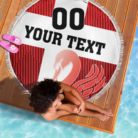 Round beach blanket with fringed edge, red-and-white 'YOUR TEXT' print and swan graphic.