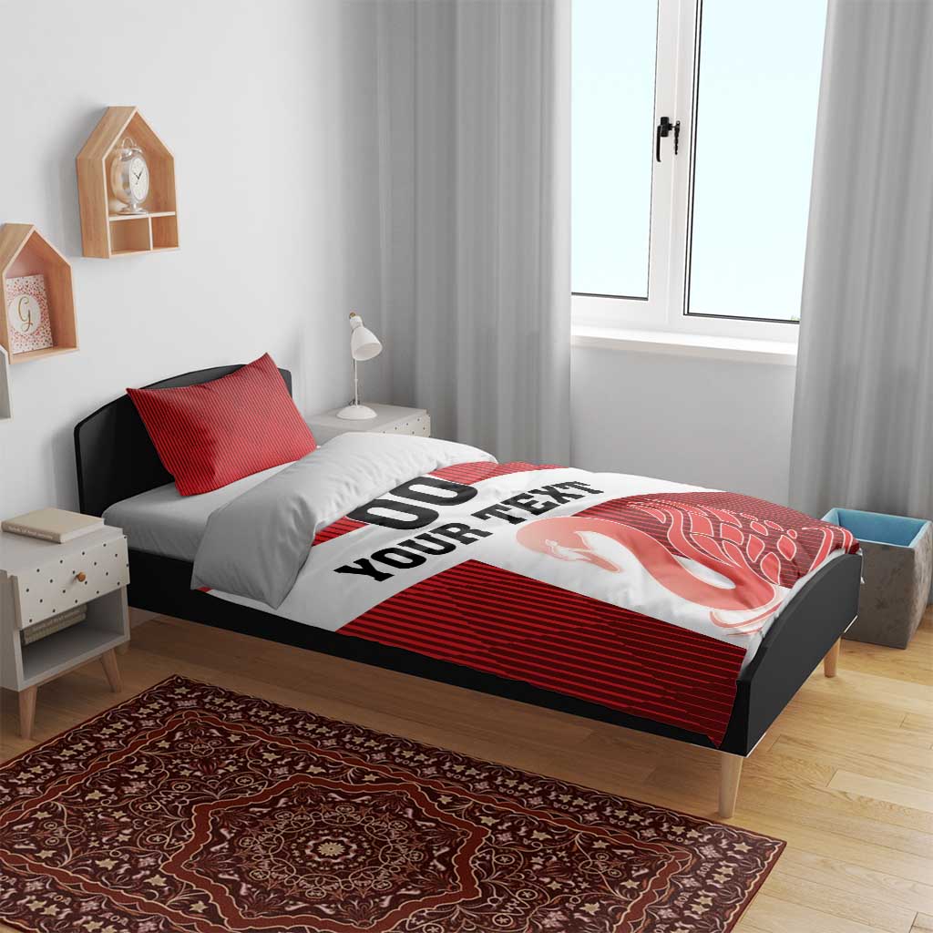 Red striped bedding set on bed with white banner “YOUR TEXT”, “00”, and swan print; duvet and pillows