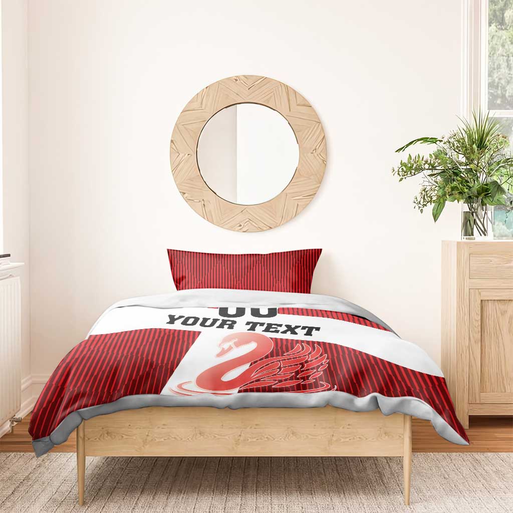 Red striped duvet cover with “YOUR TEXT”, “00”, and swan graphic across white band; two pillowcases