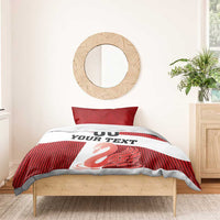 Red striped duvet cover with “YOUR TEXT”, “00”, and swan graphic across white band; two pillowcases