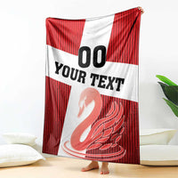 Custom football blanket draped on floor, red stripe and white with “00”, “YOUR TEXT”, swan