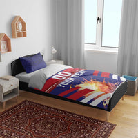 Blue and red football bedding set on a bed with 00 graphic and two pillowcases