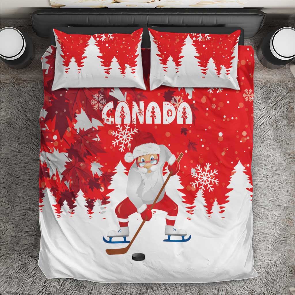 Red duvet and two matching pillows with Canada text, Santa hockey, and snowflake trees