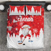Red duvet and two matching pillows with Canada text, Santa hockey, and snowflake trees
