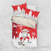 Red Christmas bedding set with Santa hockey print, snowy trees, and matching pillow set