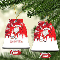 Red bell-shaped ceramic Santa hockey Christmas ornament with Canada graphic, front/back tags