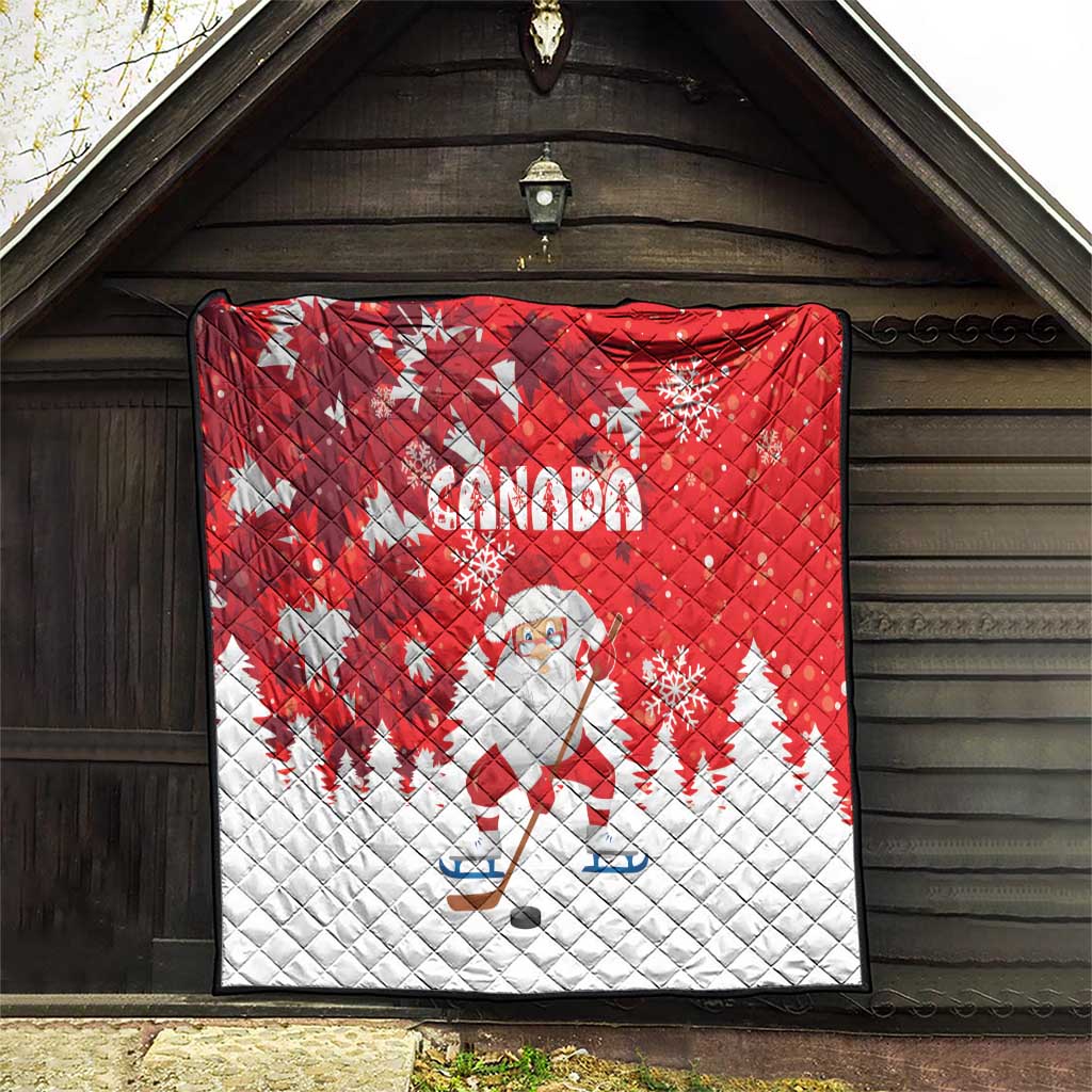Red and white Canada quilt with Santa on ice skates, snowflakes, and pine tree shapes