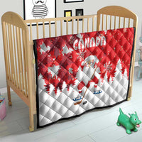Red and white Canada quilt with Santa and ice skates, snowflakes, and pine trees