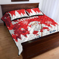 Red and white quilt bed set with Santa playing hockey, snowflake print on bedspread
