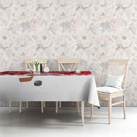 Red and white Christmas tablecloth with Santa hockey strip and snowflake accents