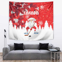 Red Christmas tapestry with Canada text, Santa on skates playing hockey, snowy pine trees