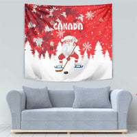 Red Christmas tapestry featuring Canada title, Santa playing hockey, snowy pine tree silhouettes