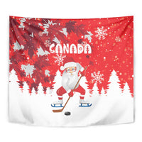 Red hanging tapestry with Canada wordmark, Santa on skates, hockey puck and snowy trees