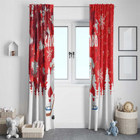 Two red and white holiday curtain panels with Santa, snowflakes, and pine trees