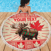 Round personalized beach blanket with moose and red maple leaf design, fringe edge, 'YOUR TEXT'.