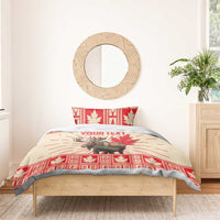 Personalized Christmas bedding set on bed with moose and maple leaf pattern