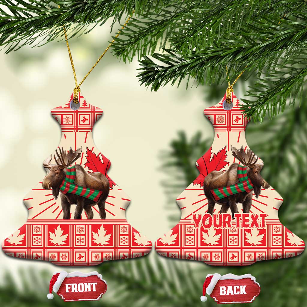 Bell-shaped ceramic moose ornaments with red maple leaf pattern, gold hanging string, front/back tags