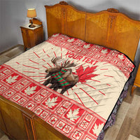 Personalized moose quilt blanket laid on bed in red and cream with maple leaf and YOUR TEXT