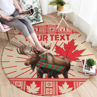 Round Christmas rug showing moose with green striped scarf, red maple leaf, "YOUR TEXT"