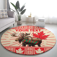 Round area rug with moose graphic, red maple leaves, and large "YOUR TEXT" text
