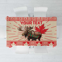 Red Christmas tablecloth with moose and maple leaf pattern