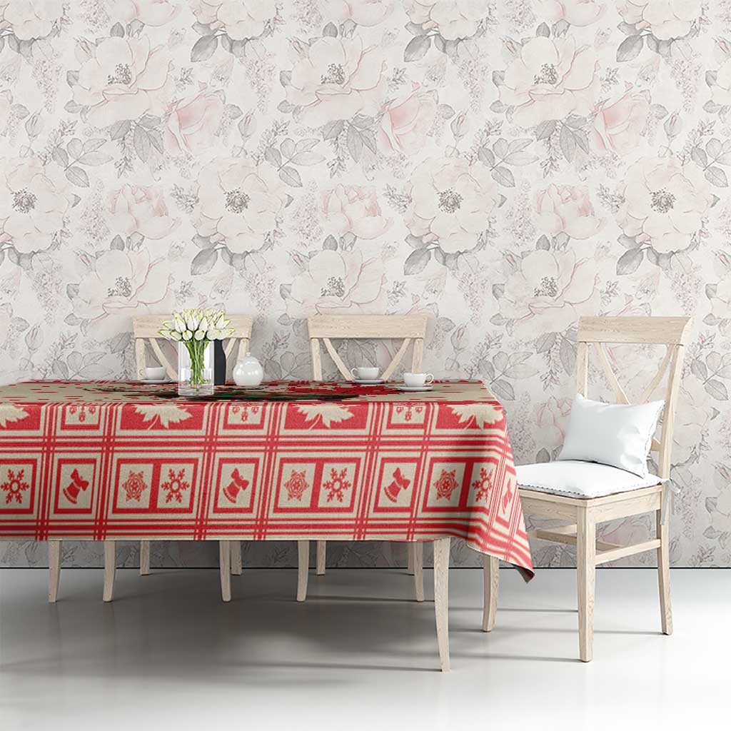 Red Christmas tablecloth with repeating maple leaf and moose print