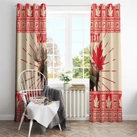 Red and cream moose window curtain panels with maple leaf burst motif and table decor