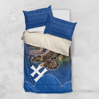 Blue bedding set with eagle, castle print, and two blue patterned pillowcases