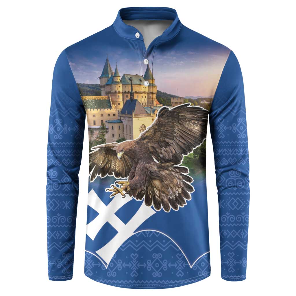 Blue button-up sweatshirt with eagle graphic, castle scene, and white Slovak pattern