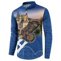 Blue button-up sweatshirt with eagle emblem, castle print, and patterned sleeves