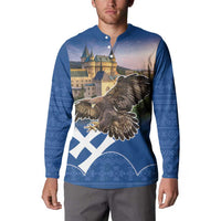 Blue button-up sweatshirt worn by a man, featuring front eagle and castle print