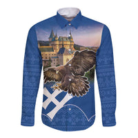 Blue long sleeve button shirt with eagle and castle graphic, folk pattern