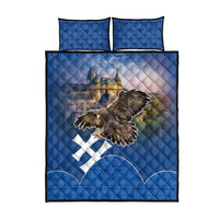 Blue quilt and pillow set featuring eagle and castle artwork with white-and-blue cross motif