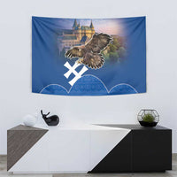 Blue wall tapestry showing an eagle, castle backdrop, white cross emblem, and patterned hills