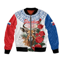 White bomber jacket with red and blue sleeves, black rib trim, front zip, animal and roses