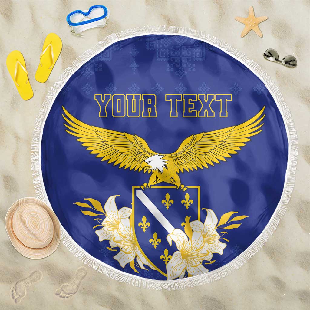 Round blue beach blanket with gold eagle, floral fleurs-de-lis shield, fringe edge; "YOUR TEXT"