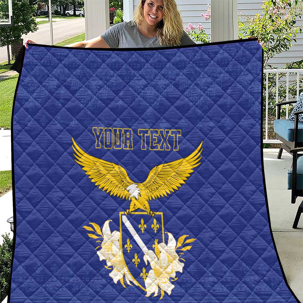Blue quilt with diamond stitching and gold eagle crest, featuring 'YOUR TEXT'