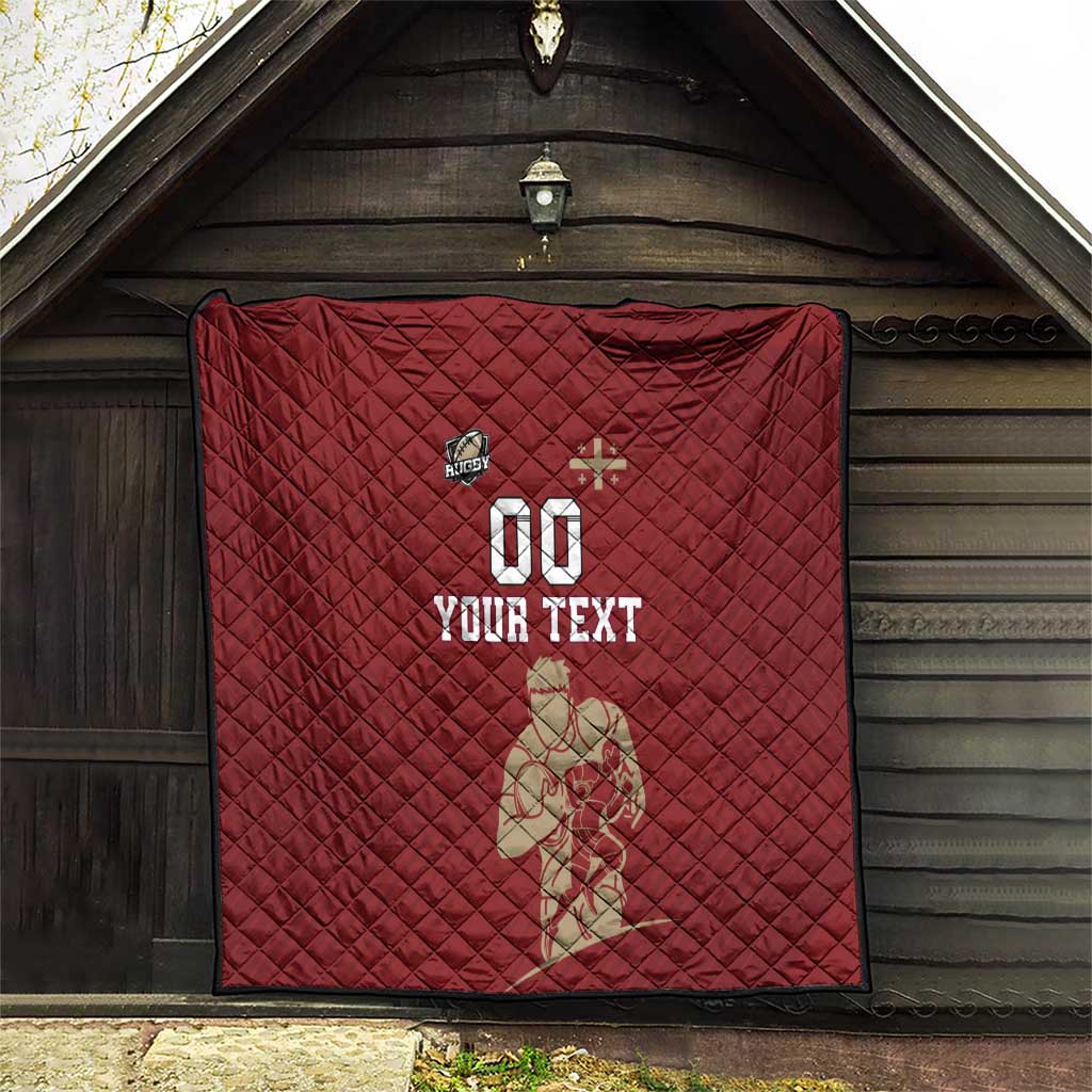 Red quilt hung under a porch roof, diamond pattern with rugby '00' and 'YOUR TEXT'