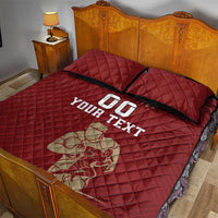 Red quilted bed set with two pillow shams, custom 'YOUR TEXT' print and rugby figures.
