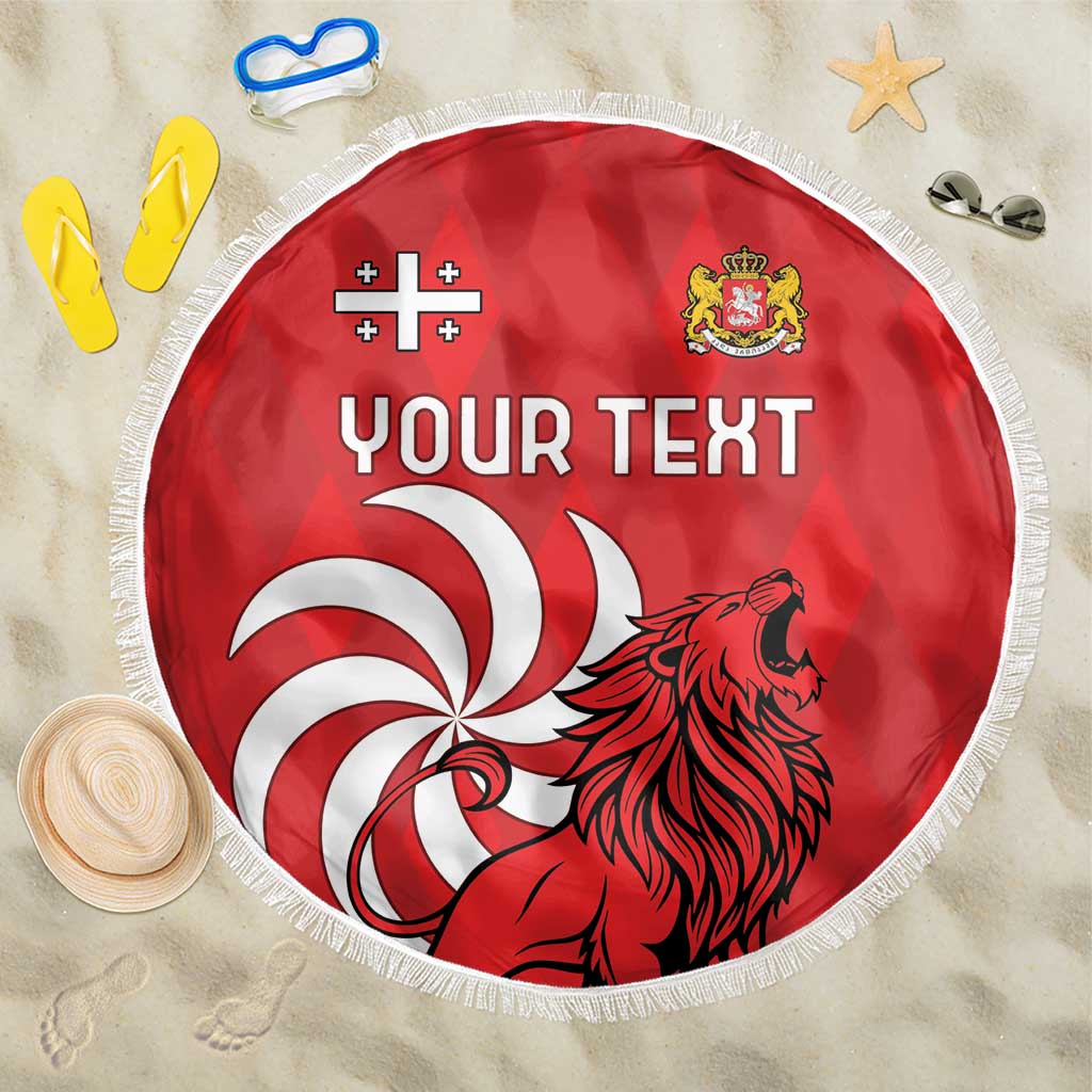 Red round beach blanket with fringe, lion graphic and “YOUR TEXT” print
