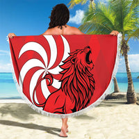 Red round beach blanket with fringe, lion graphic and “YOUR TEXT” print, held up