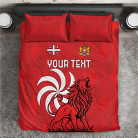 Red personalized bedding set with lion graphic, “YOUR TEXT,” and two matching pillowcases