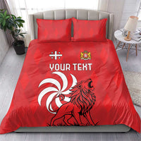Red personalized bedding set with lion emblem, “YOUR TEXT,” and two front pillowcases