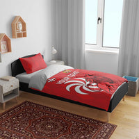 Red personalized bedding set with lion graphic and “YOUR TEXT” on duvet, red pillow