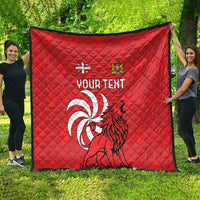 Red quilt with diamond quilting, lion graphic, crest emblem, and “YOUR TEXT”