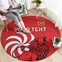 Red round area rug with lion illustration and crest, custom 'YOUR TEXT' graphic